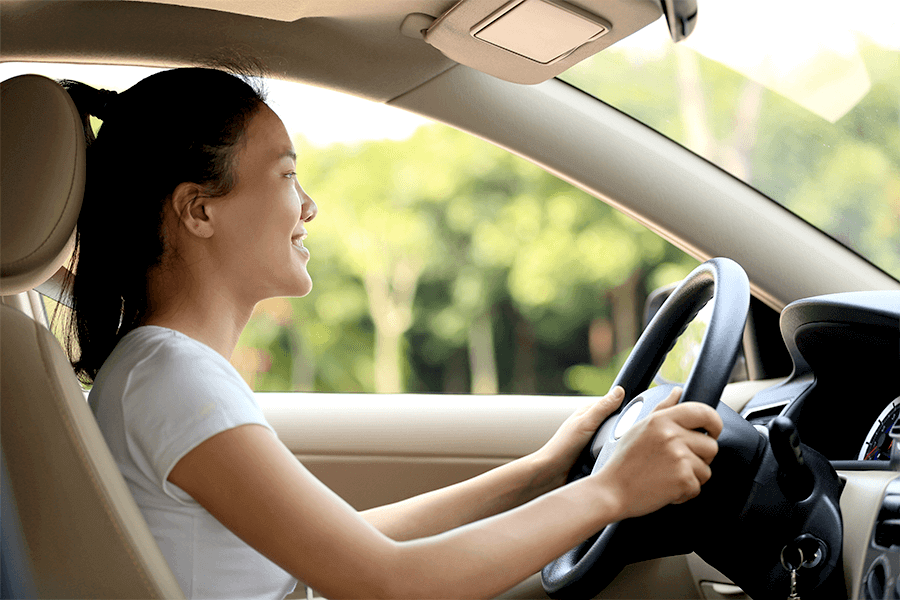 Woman with good driving posture