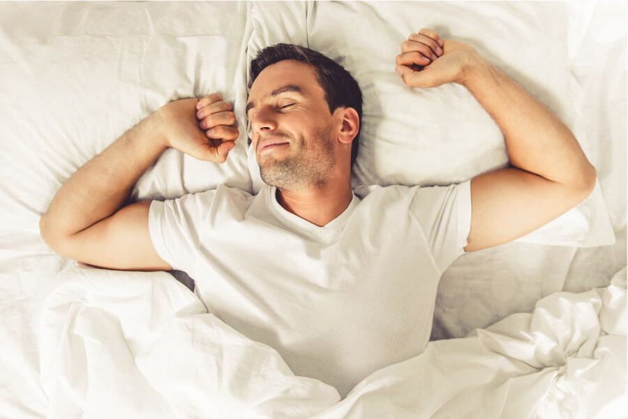 Man who has trained himself to sleep on his back