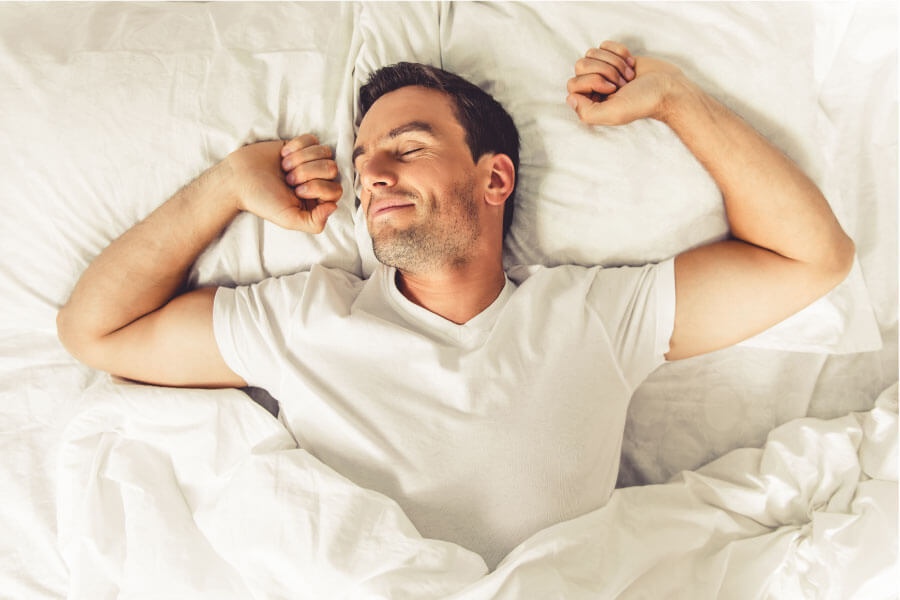 Man who has trained himself to sleep on his back