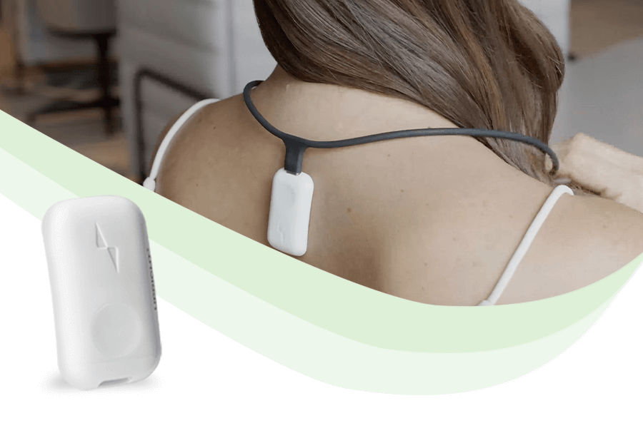 Upright Go2 and Upright Necklace on a woman's back