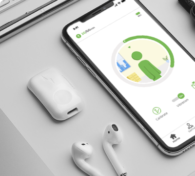 Smartphone showing the Upright app with an Upright Go and Airpods